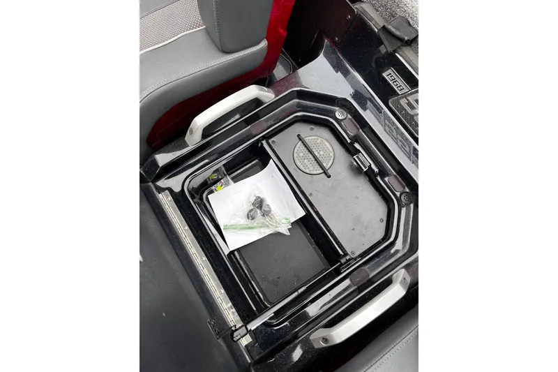 Slide: The Image of 2023 Ranger Z520R Ranger Cup Equipped storage compartment with accessories. - 7