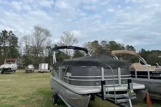 Slide: The Image of 2020 Sylvan Mirage Fish 820 Party Fish boat interior with steering wheel and seating. - 3