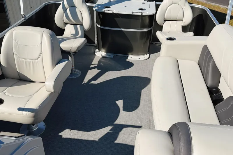 Slide: The Image of 2020 Sylvan Mirage Fish 820 Party Fish boat interior with steering console and seating. - 4