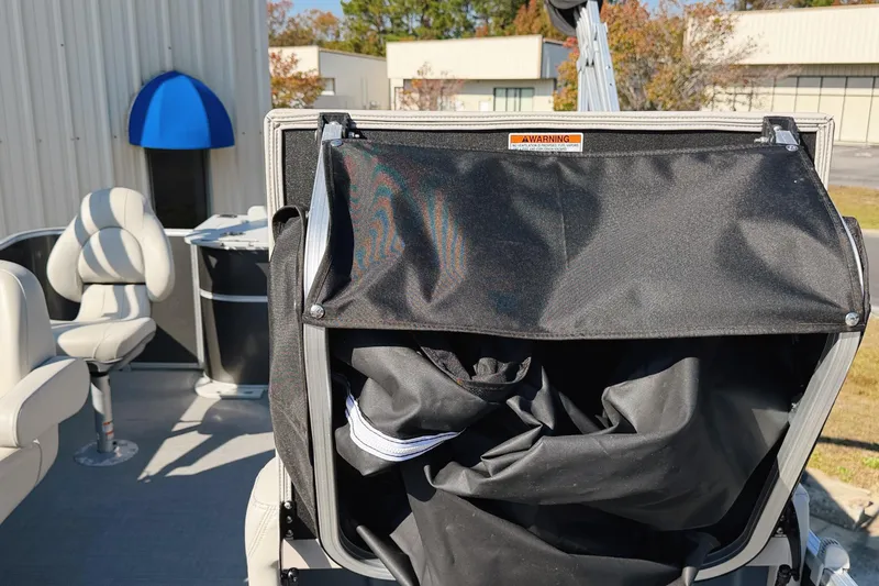 Slide: The Image of 2020 Sylvan Mirage Fish 820 Party Fish dashboard with steering wheel and controls. - 8