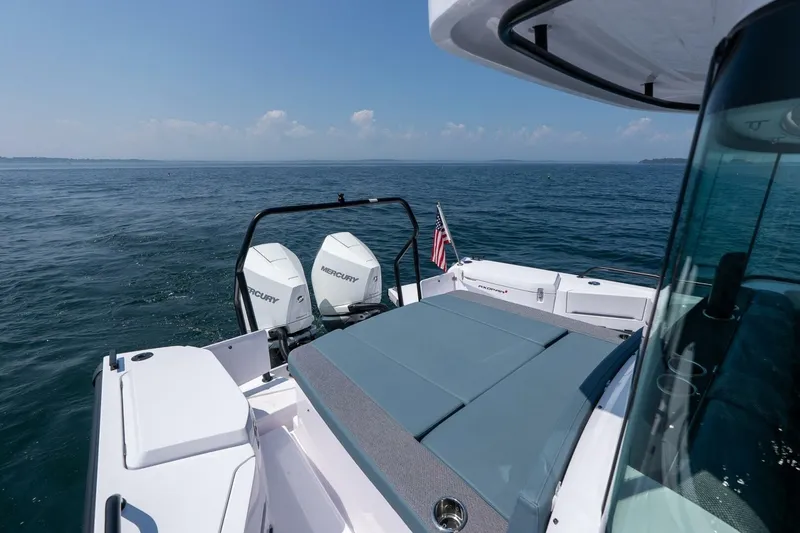 Slide: The Image of Axopar 37 U-Sofa 2026 on open sea with Mercury engines. - 18