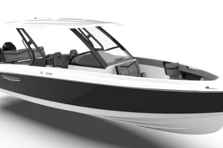Slide: The Image of 2026 Monterey Elite 30 OB boat dashboard with modern steering and touchscreen display. - 15