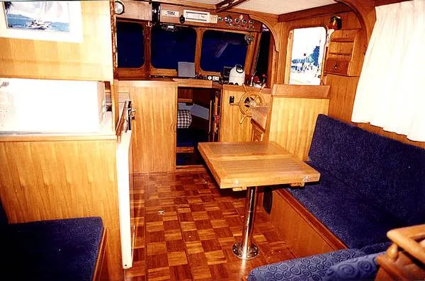 Slide: The Image of Interior of a 1979 CHB Double Cabin Trawler with wood finish. - 1