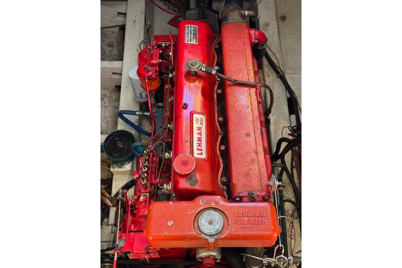 Slide: The Image of 1979 CHB Double Cabin Trawler engine, Lehman Ford diesel, vibrant red color. - 7