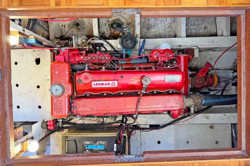 Slide: The Image of 1979 CHB Double Cabin Trawler engine compartment with Lehman Ford diesel engine. - 8