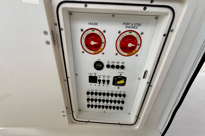 Slide: The Image of Electrical control panel on a 2026 Pursuit DC 266 Dual Console boat. - 29