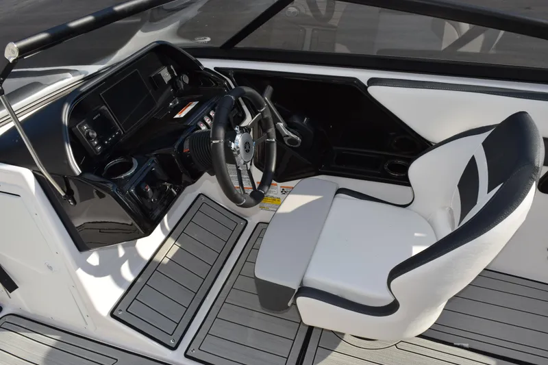 Slide: The Image of 2026 Yamaha Boats 195S cockpit with sleek steering wheel and modern dashboard design. - 11