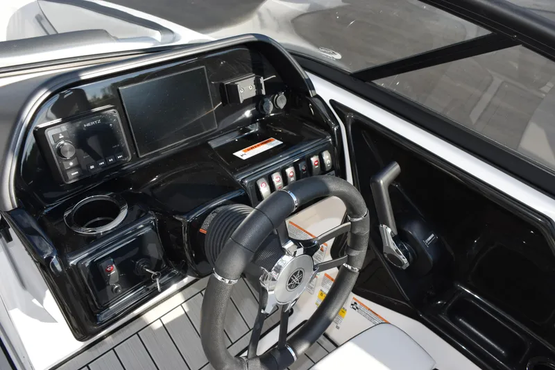 Slide: The Image of 2026 Yamaha Boats 195S dashboard with steering wheel and control panel. - 12