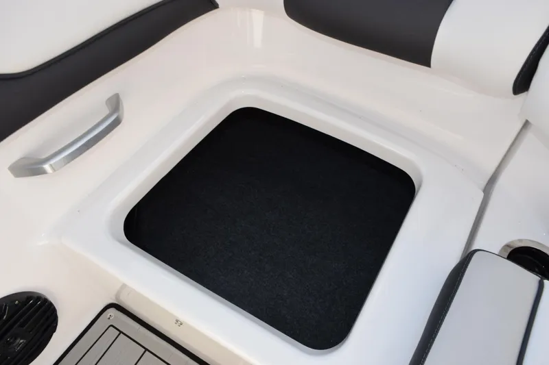 Slide: The Image of 2026 Yamaha Boats 195S interior storage compartment with sleek design and modern features. - 18