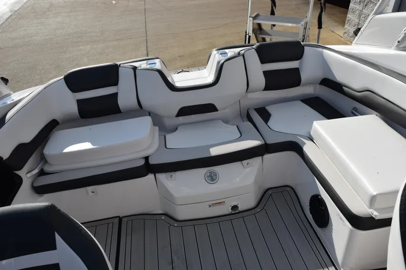 Slide: The Image of 2026 Yamaha Boats 195S interior seating with modern design and comfortable cushions. - 9