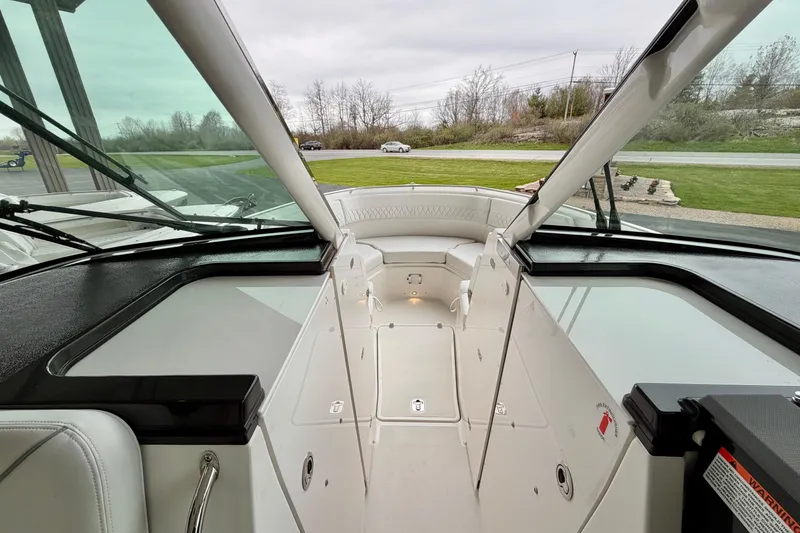 Slide: The Image of Interior view of Pursuit DC 326 Dual Console 2026. - 21