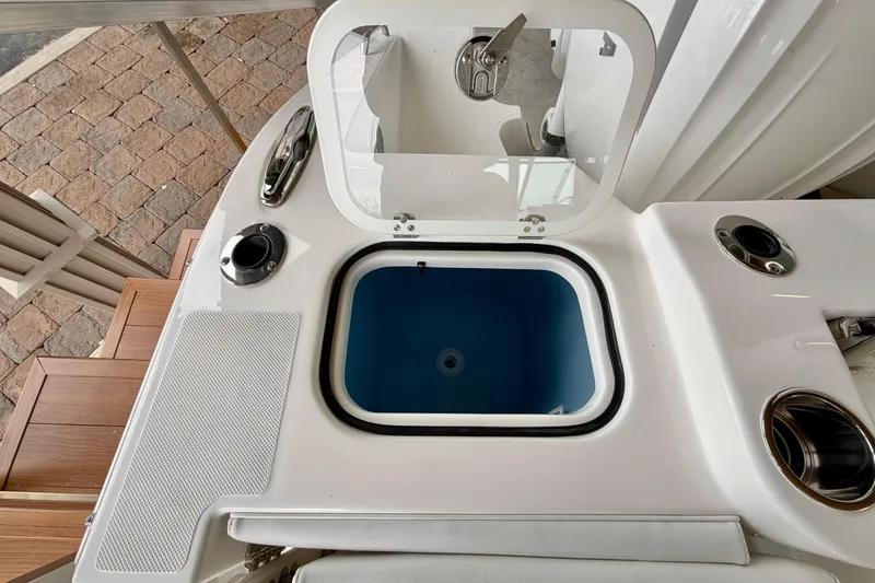 Slide: The Image of Pursuit DC 326 Dual Console 2026, boat equipment with storage compartment. - 30