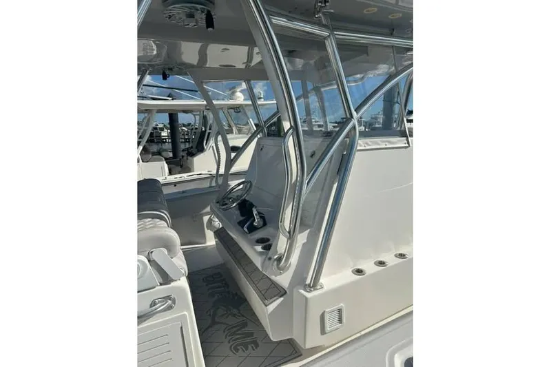 Slide: The Image of 2026 Solara S-310 SB boat interior with sleek design and modern controls. - 11