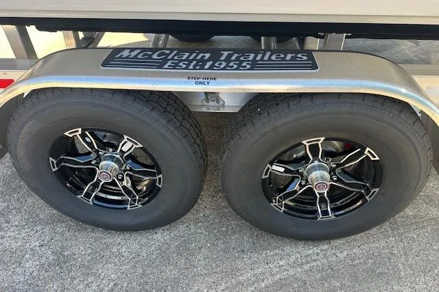 Slide: The Image of Trailer wheels of a 2026 Tidewater 282 CC Adventure boat on McClain Trailers. - 15