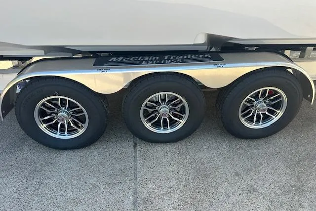 Slide: The Image of Triple-axle trailer for 2026 Tidewater 302 CC Adventure boat. - 14