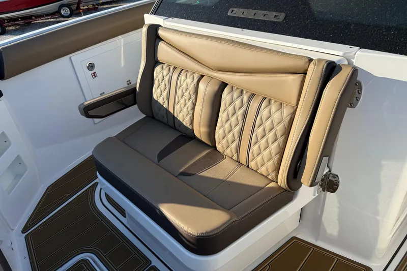 Slide: The Image of Luxurious seating on 2026 Monterey Elite 30 OB boat with quilted upholstery. - 9