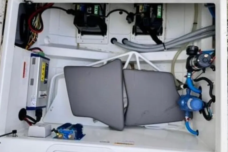 Slide: The Image of 2023 Jeanneau Leader 7.5 CC S3 boat interior wiring and equipment setup. - 12