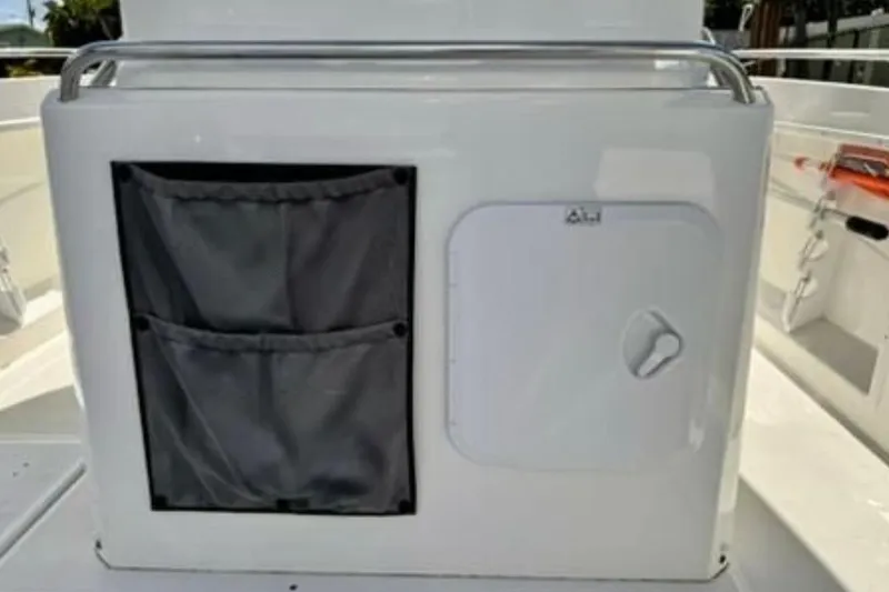 Slide: The Image of 2023 Jeanneau Leader 7.5 CC S3 boat interior storage compartment and fabric pockets. - 13