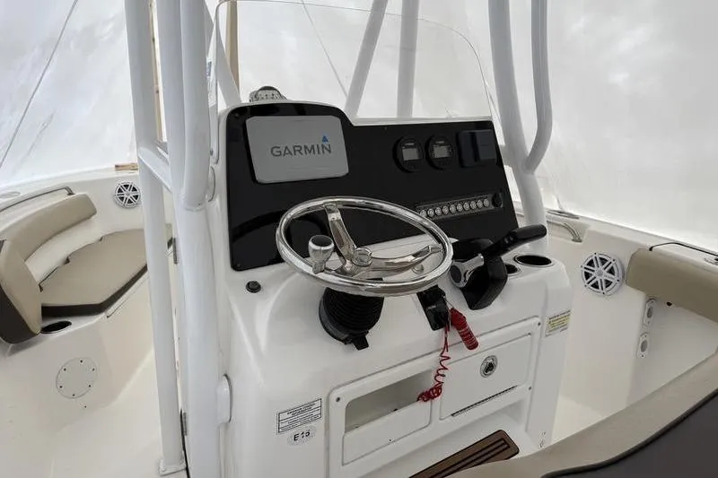 Slide: The Image of 2019 Tidewater 210 CC Adventure boat console with Garmin navigation system. - 4