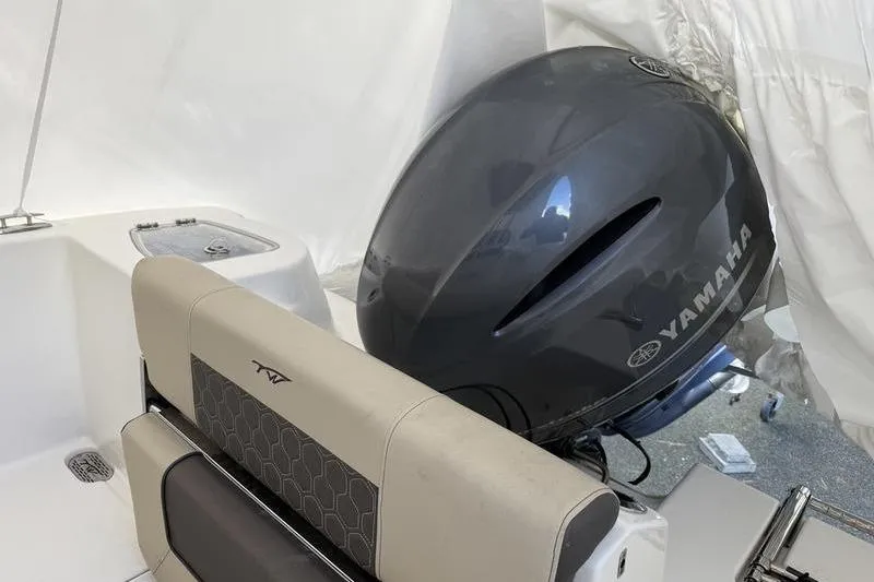 Slide: The Image of 2019 Tidewater 210 CC Adventure boat with Yamaha outboard motor, interior view. - 6