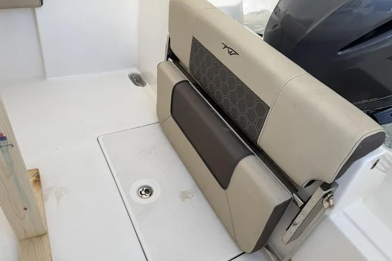 Slide: The Image of 2019 Tidewater 210 CC Adventure boat seat and deck detail. - 7