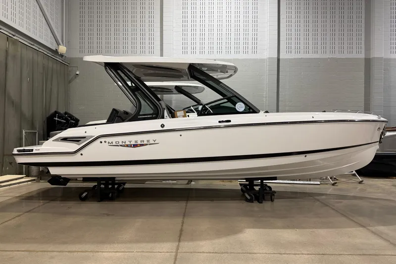 The Image of 2026 Monterey Elite 27 SD boat displayed indoors on stands. - 0