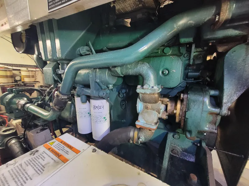 Slide: The Image of Engine of 1998 Custom Carolina 45 Willis Boatworks, showcasing intricate mechanical components. - 33