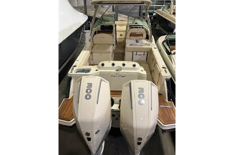 Slide: The Image of 2023 Chris-Craft Calypso 28 boat with dual 300 horsepower engines, interior view. - 14