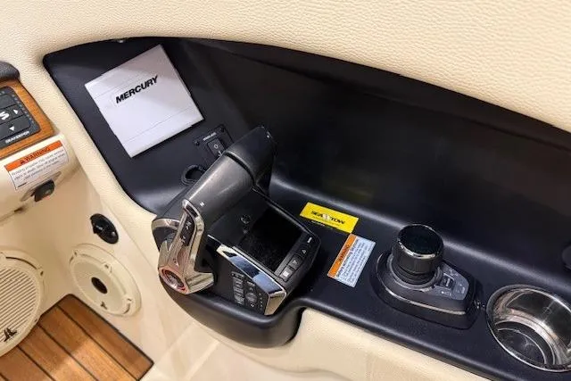 Slide: The Image of Control panel of 2023 Chris-Craft Calypso 28 boat with Mercury components. - 25