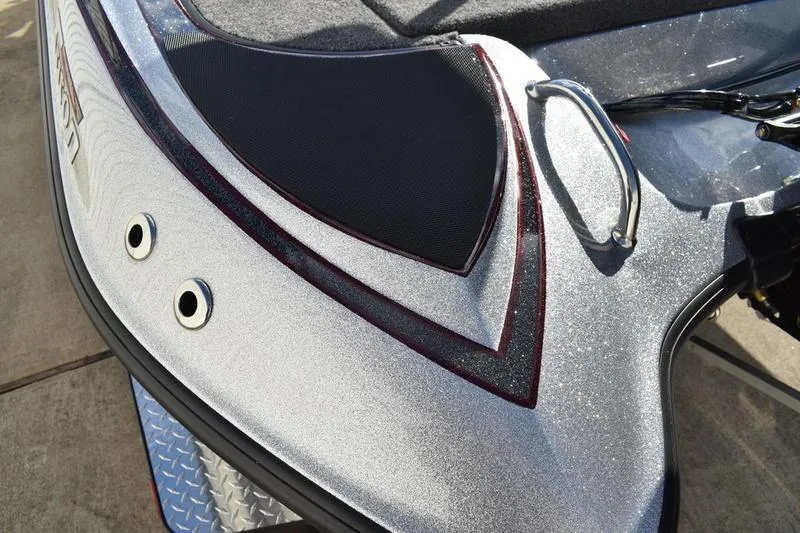 Slide: The Image of 2026 Triton 179 TrX boat with metallic finish and sleek design details. - 27