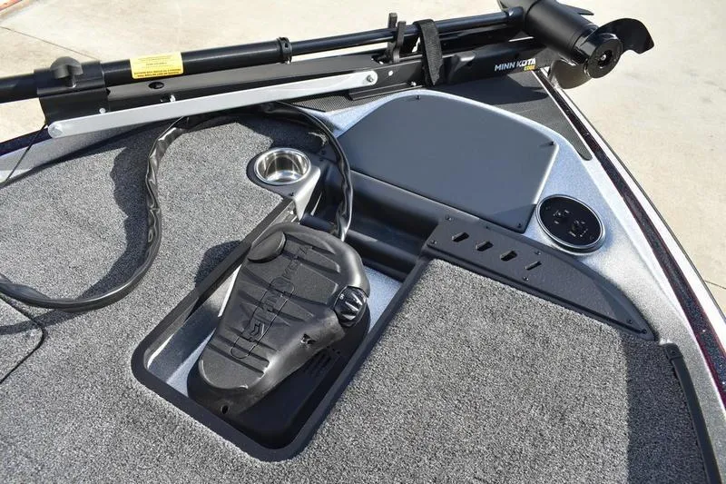 Slide: The Image of 2026 Triton 179 TrX boat deck with Minn Kota trolling motor and foot pedal. - 30