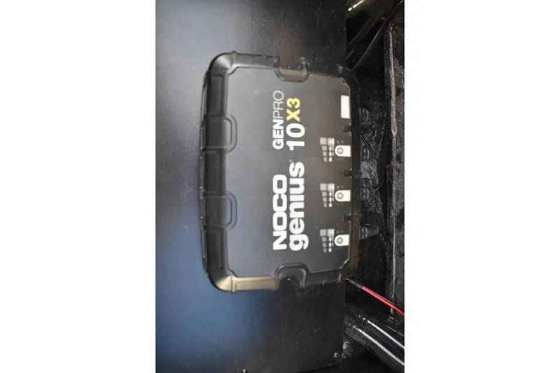 Slide: The Image of NOCO Genius GENPRO 10X3 charger installed in 2026 Triton 179 TrX boat. - 35