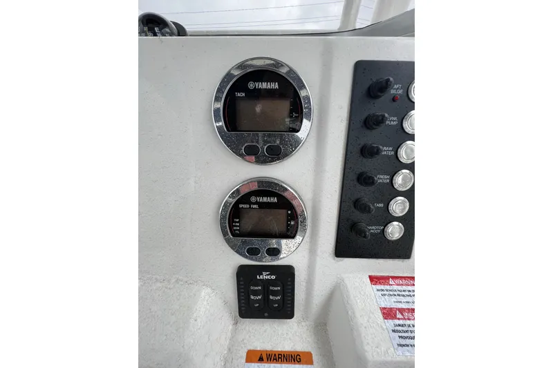Slide: The Image of Control panel of 2021 Robalo R222 Center Console with Yamaha gauges and switches. - 8