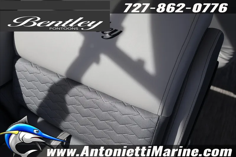 Slide: The Image of 2026 Bentley Pontoons Elite 253 Admiral seat detail with logo and contact information. - 10