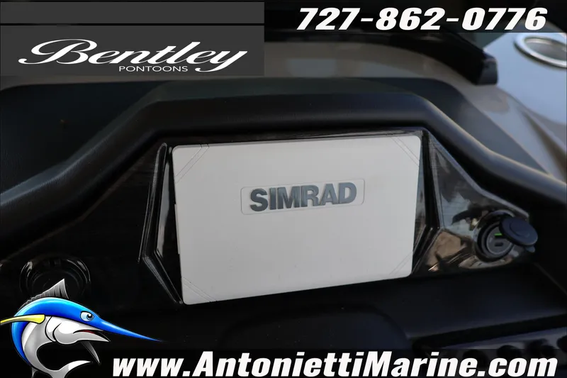 Slide: The Image of Bentley Pontoons Elite 253 Admiral dashboard featuring Simrad display, Antonietti Marine branding. - 14