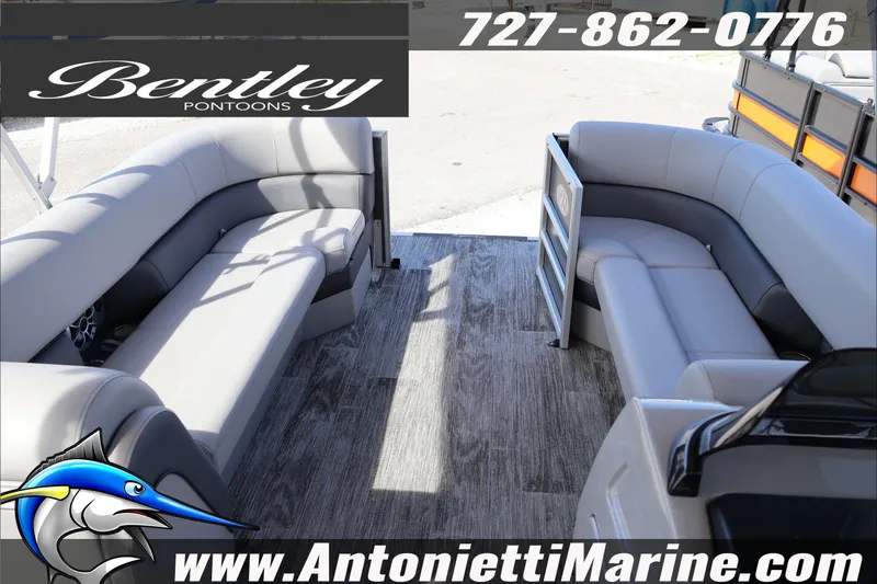 Slide: The Image of 2026 Bentley Pontoons Elite 253 Admiral interior with luxurious seating and modern design. - 18