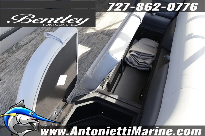Slide: The Image of 2026 Bentley Pontoons Elite 253 Admiral interior storage view. - 21