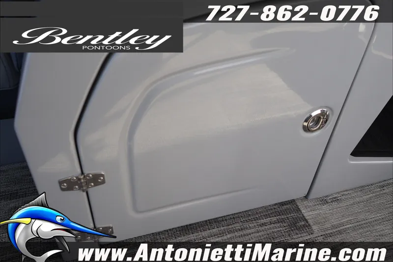 Slide: The Image of 2026 Bentley Pontoons Elite 253 Admiral door detail with contact info and logo. - 22