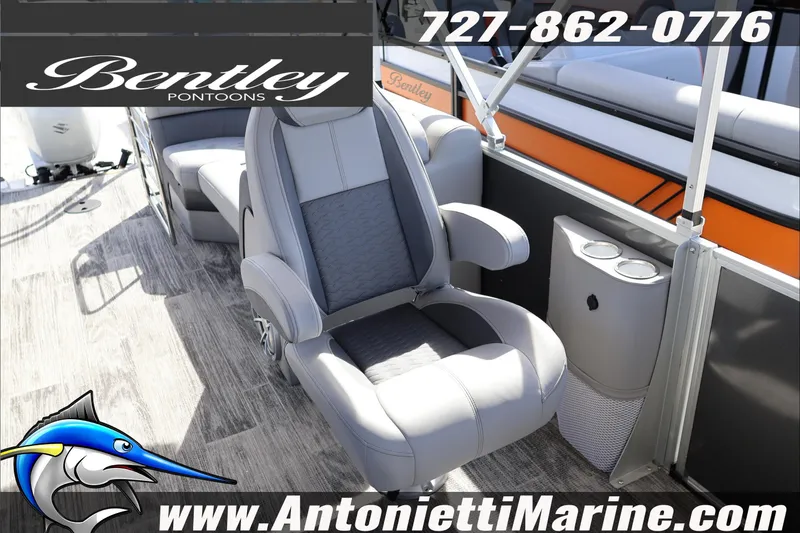 Slide: The Image of 2026 Bentley Pontoons Elite 253 Admiral interior with luxury seating and cup holders. - 24