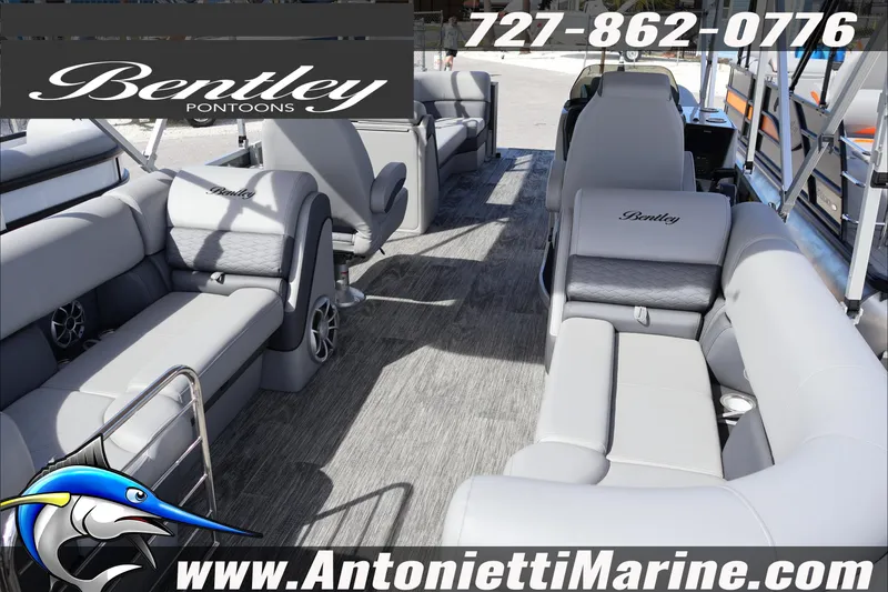 Slide: The Image of 2026 Bentley Pontoons Elite 253 Admiral interior with luxurious seating and modern design. - 7