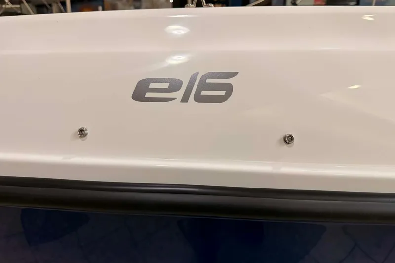 Slide: The Image of 2025 Bayliner Element E16 boat logo on white surface. - 1