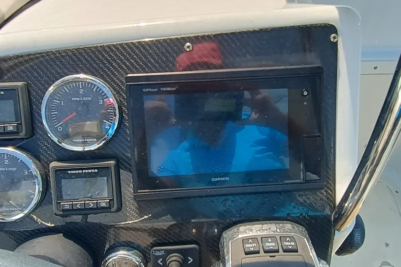 Slide: The Image of Dashboard of 2006 Royal Denship Royal Limo with Garmin GPS and Volvo Penta gauges. - 22