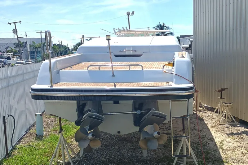 Slide: The Image of 2006 Royal Denship Royal Limo yacht on stands, rear view, outdoor setting. - 7