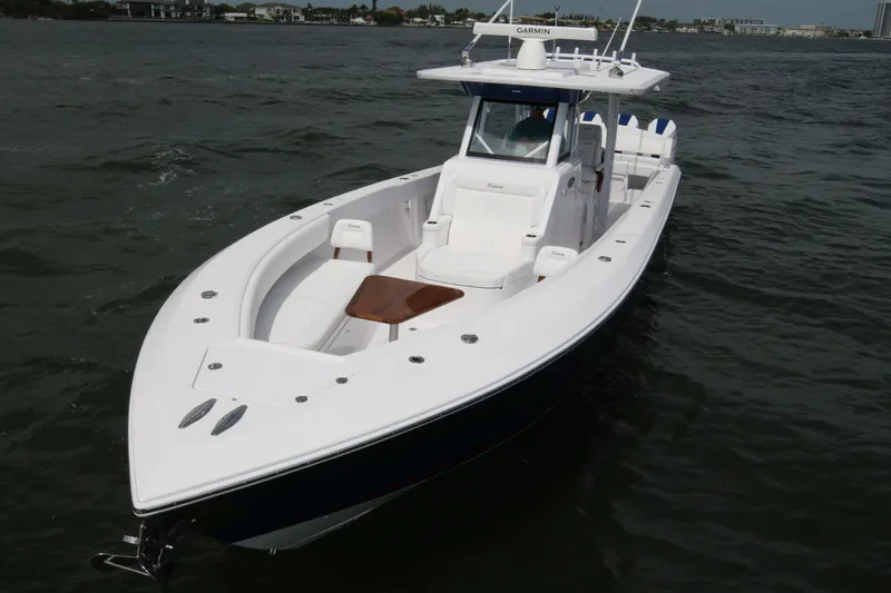 Slide: The Image of 2026 Bahama 41 GT boat on water, featuring sleek design and spacious deck. - 40