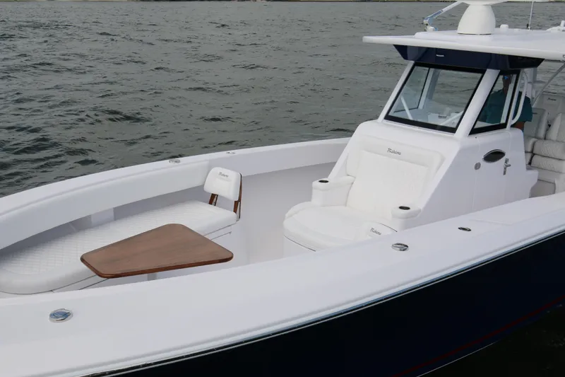 Slide: The Image of 2026 Bahama 41 GT boat with sleek design and comfortable seating on the water. - 48
