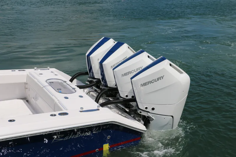 Slide: The Image of 2026 Bahama 41 GT boat with triple Mercury outboard engines on water. - 5