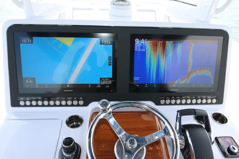 Slide: The Image of Dashboard of 2026 Bahama 41 GT with dual Garmin navigation screens. - 76