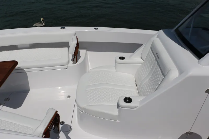 Slide: The Image of Luxurious seating on 2026 Bahama 41 GT boat with elegant white upholstery. - 80