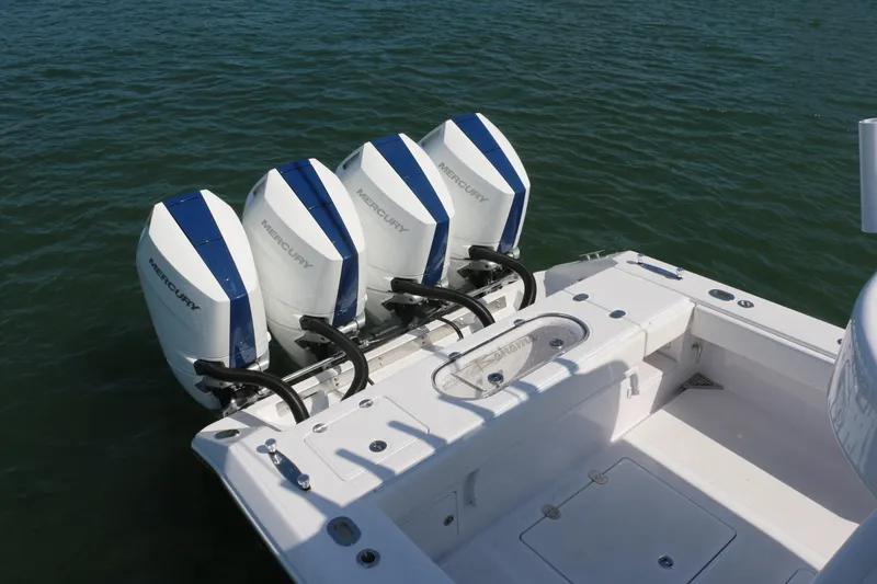 Slide: The Image of 2026 Bahama 41 GT boat with four Mercury outboard engines on water. - 82