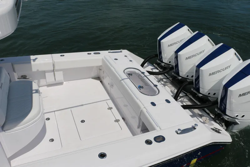 Slide: The Image of 2026 Bahama 41 GT boat with four Mercury outboard engines on water. - 9